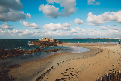 Scenic view of beach against sky