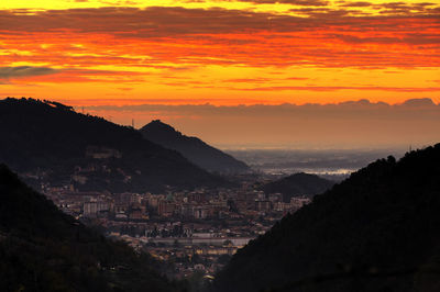 High angle view of city at sunset