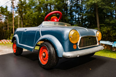 Close-up of toy car on road