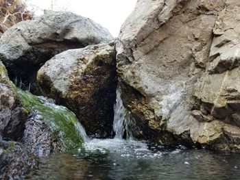 Stream flowing through rocks