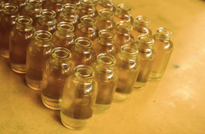 High angle view of drinking glasses on table