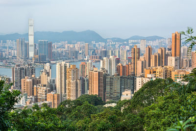 Buildings in city against sky