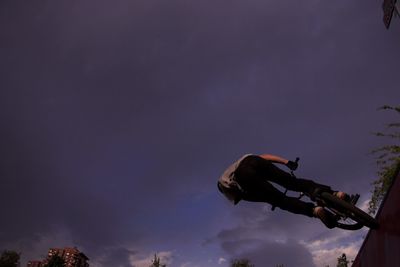 Low angle view of man against sky