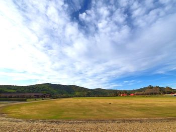 Scenic view of field against sky