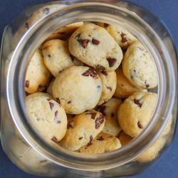 Directly above shot of chocolate chip cookies in jar on table