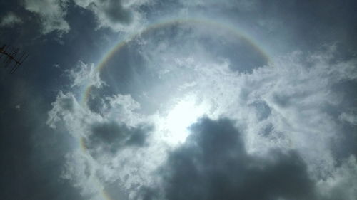 Low angle view of rainbow in sky