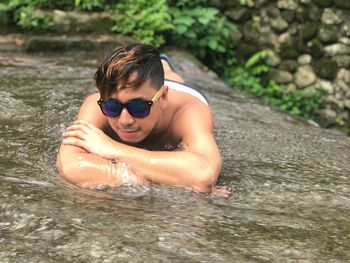 Portrait of man in swimming pool