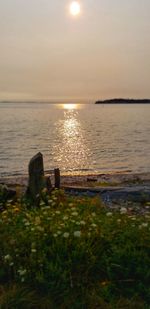 Scenic view of sea against sky during sunset