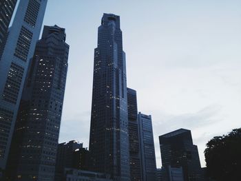 Low angle view of modern buildings against sky