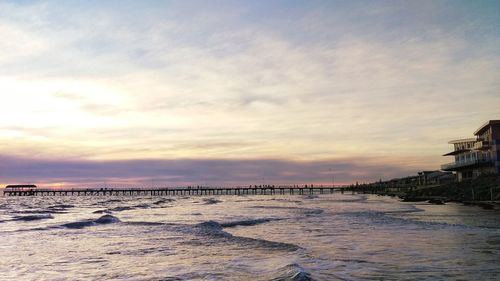 Scenic view of sea against sky at sunset