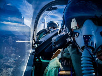 Portrait of people sitting in airplane