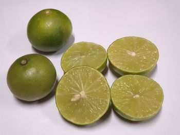 High angle view of fruits on white background