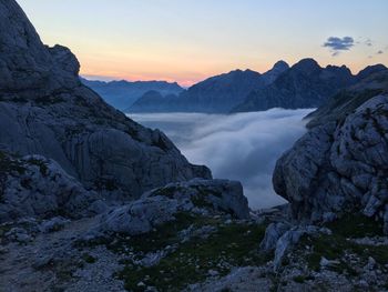 Scenic view of mountains against sky during sunset