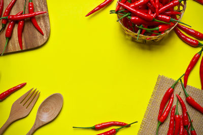 High angle view of red chili peppers on table