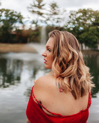 Portrait of woman standing in water