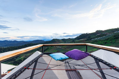 Net balcony with beautiful landscape agriculture field view