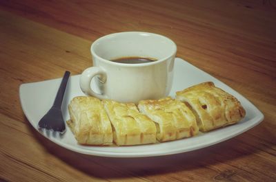 Close-up of breakfast served on table