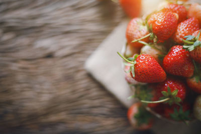 High angle view of strawberries on table