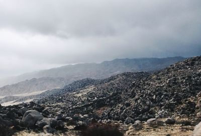 Scenic view of mountains against sky during winter