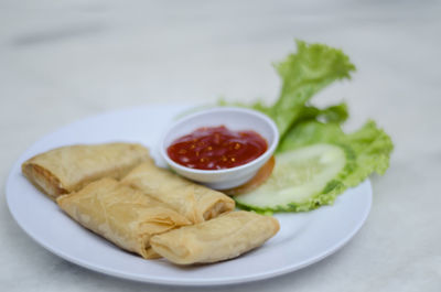 Close-up of food in plate on table