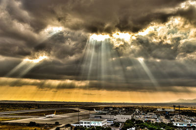 Scenic view of sea against dramatic sky