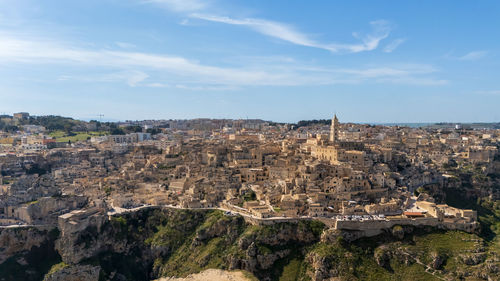 Aerial view of townscape against sky