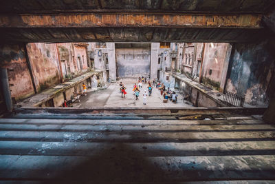 High angle view of people on stage in building