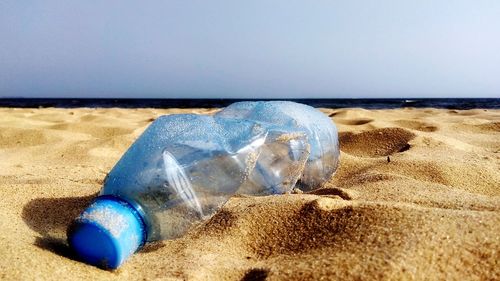 Close-up of sea water on beach