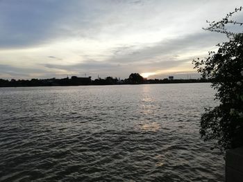 Scenic view of sea against sky at sunset