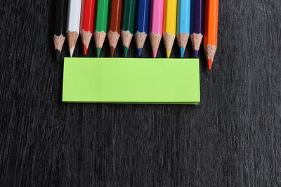 Directly above shot of multi colored pencils on table