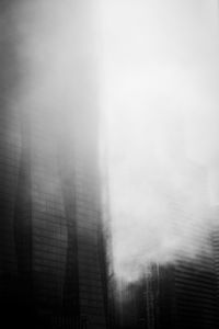 Low angle view of buildings in city against sky