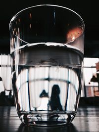 Close-up of a glass of water on table