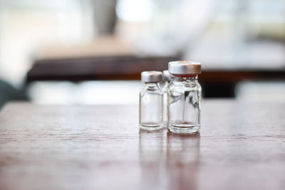 Close-up of glass of jar on table