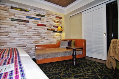 Empty chairs and table against wall at home