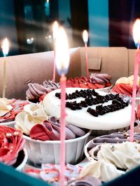 Burning candles on cake