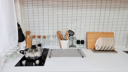 Tables and chairs on table at home