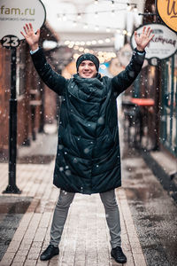 Full length of a man standing in rain