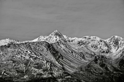 Scenic view of snowcapped mountain against sky