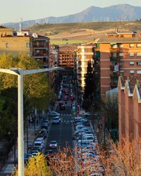 High angle view of street amidst buildings in city