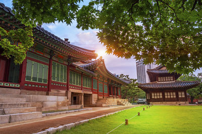 View of temple against building