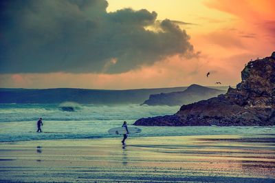 Scenic view of sea at sunset