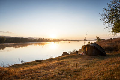 Fishing adventures, carp fishing in sunrise.