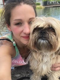 Portrait of woman with dog