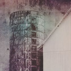 Built structure against brick wall