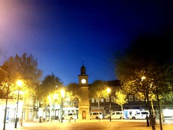 Illuminated street light at night