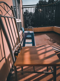 Empty chairs and tables in building