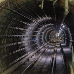 Railroad tracks in tunnel