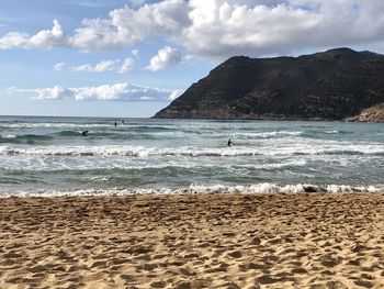 Scenic view of beach against sky