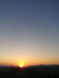 Silhouette of trees at sunset