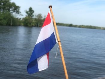 Flag against blue sky